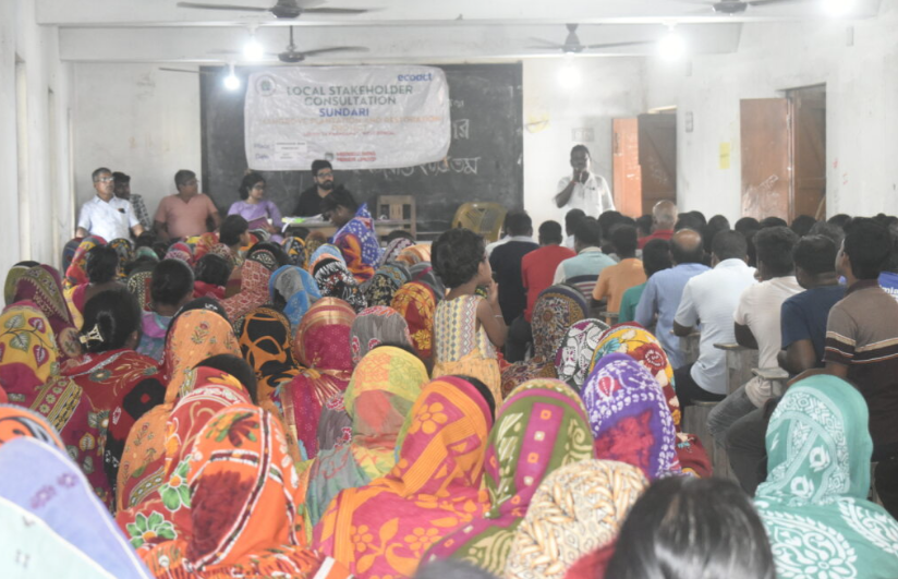 Women in bright saris seated at a Sundari stakeholder consultation